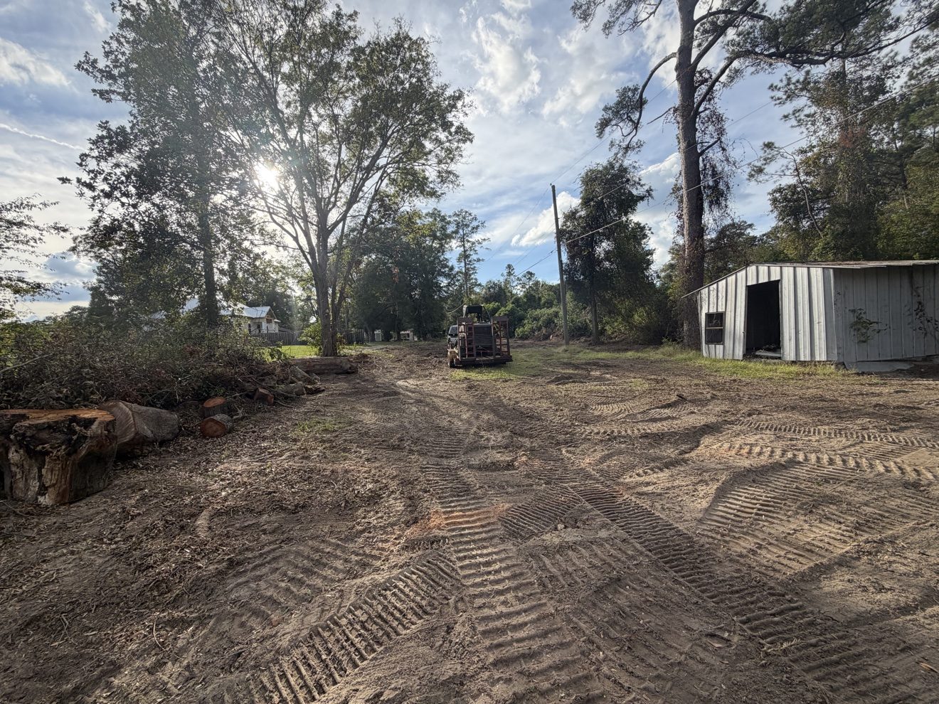 Graded dirt after debris field cleared